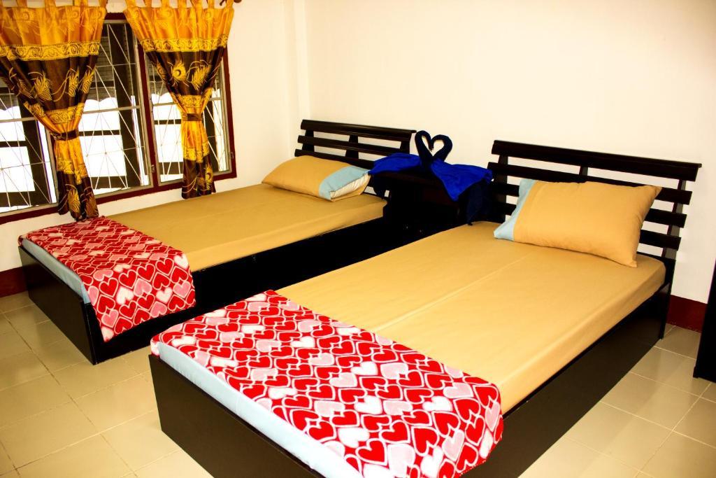 Walkinn Guesthouse 1 Chiang Mai Værelse billede